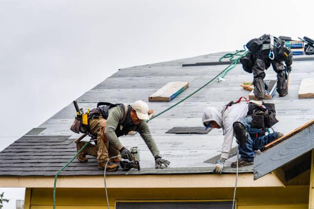 Professional Gutter Installation technician working in Durham, CT